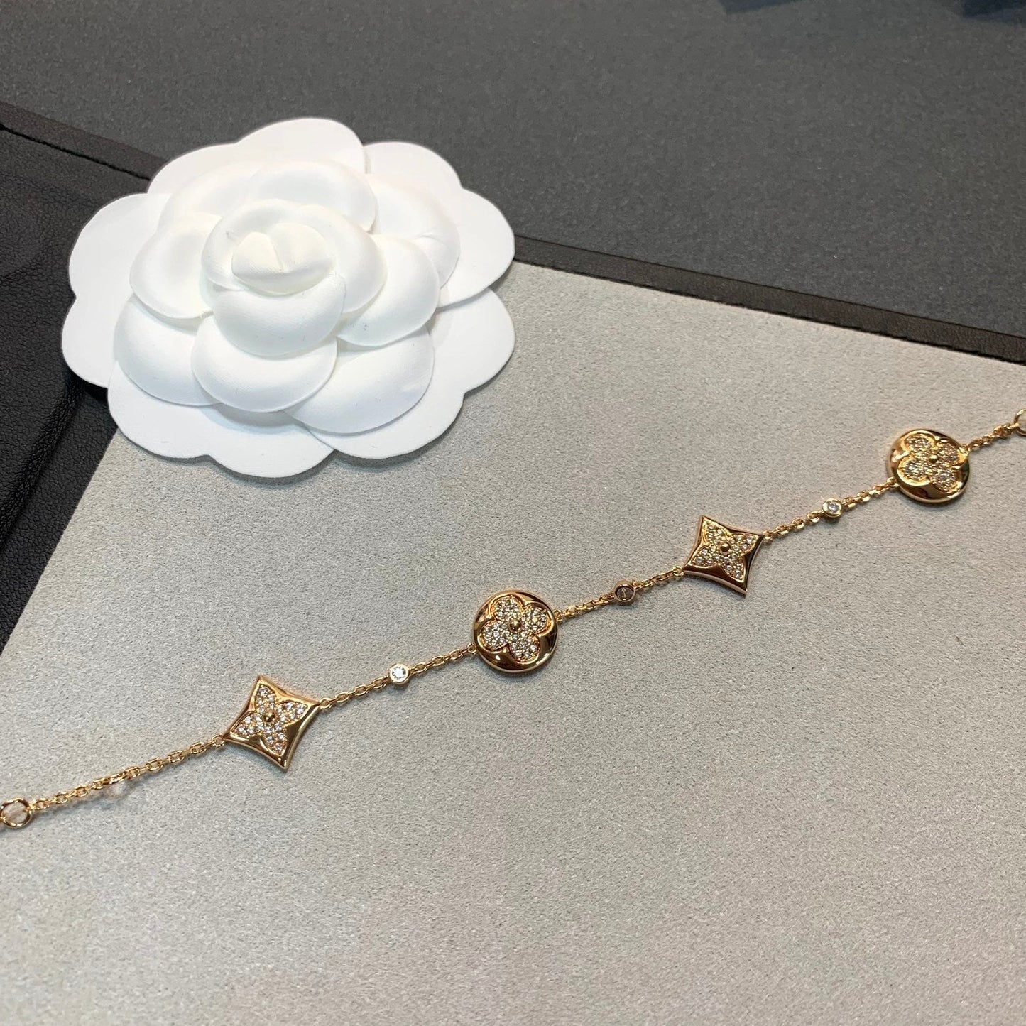 DIANA STAR AND SUN 4 MOTIFS GOLD DIAMONDS BRACELET