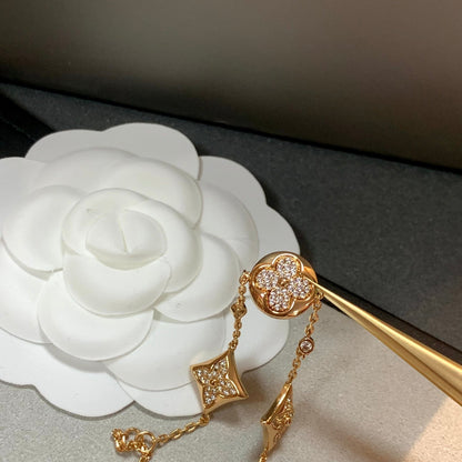 DIANA STAR AND SUN 4 MOTIFS GOLD DIAMONDS BRACELET