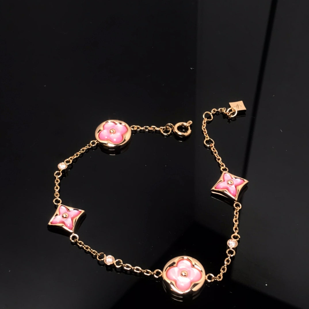DIANA STAR AND SUN 4 MOTIF PINK MOP PINK GOLD BRACELET