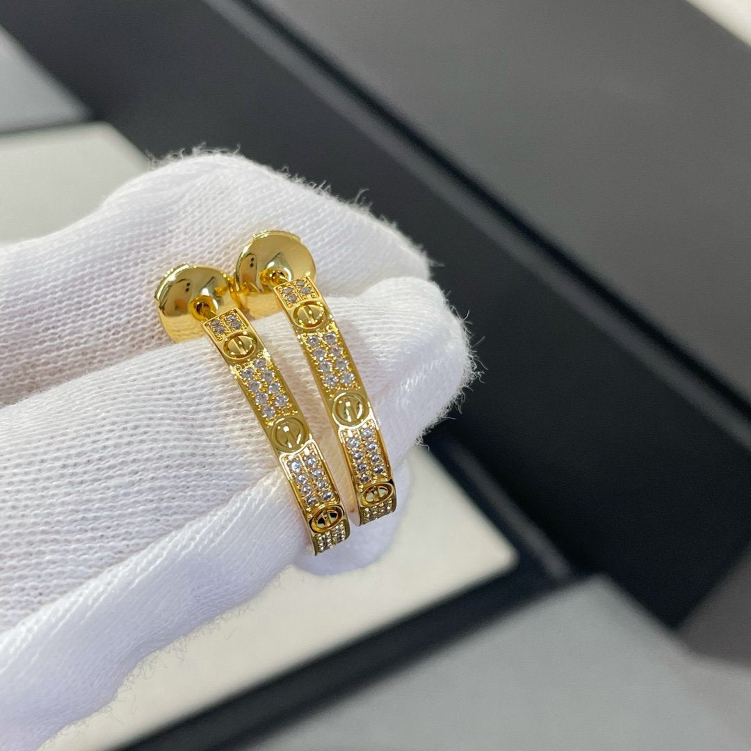Boucles d'oreilles créoles en or et diamants Diana Love