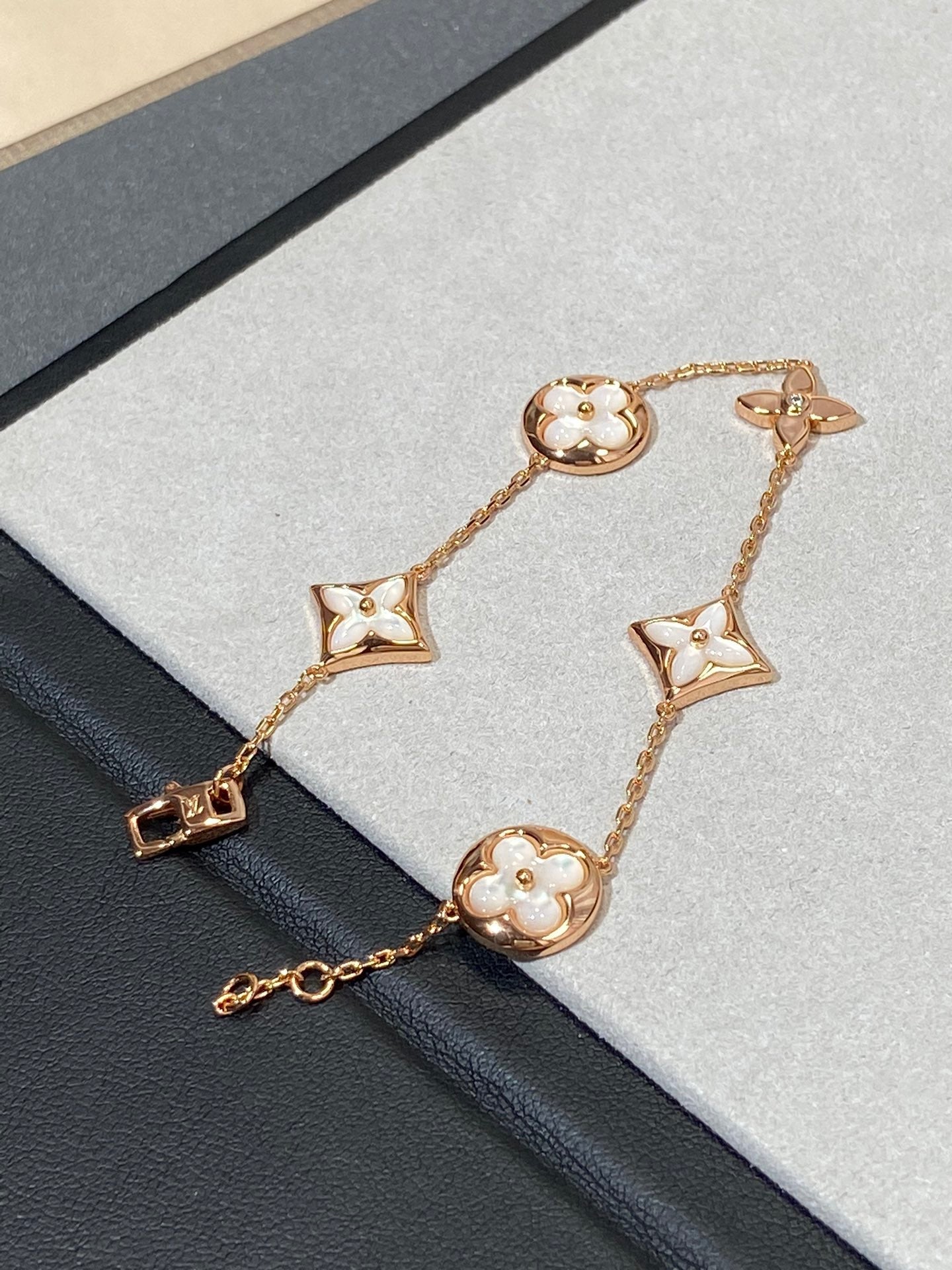 DIANA STAR AND SUN 5 MOTIF MOP PINK GOLD BRACELET