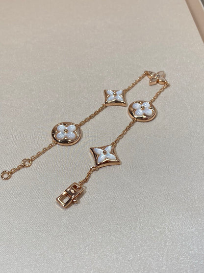 DIANA STAR AND SUN 5 MOTIF MOP PINK GOLD BRACELET