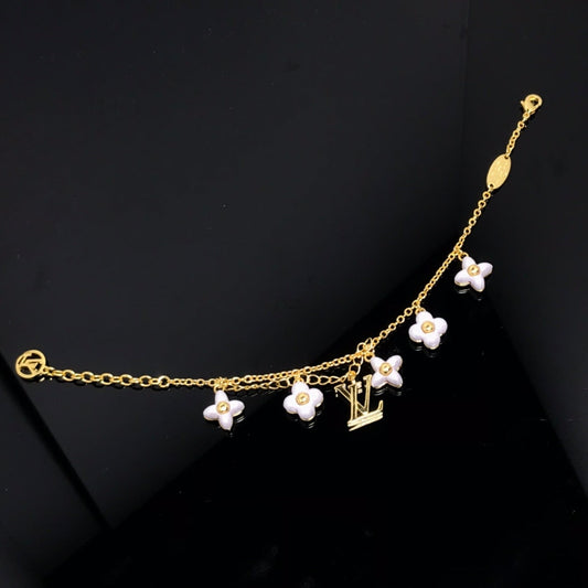 DIANA LOGO 6 MOTIF STAR AND SUN GOLD BRACELET