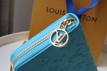 ZIPPY WALLET 19 CLOUD BLUE EMBOSSED LAMBSKIN