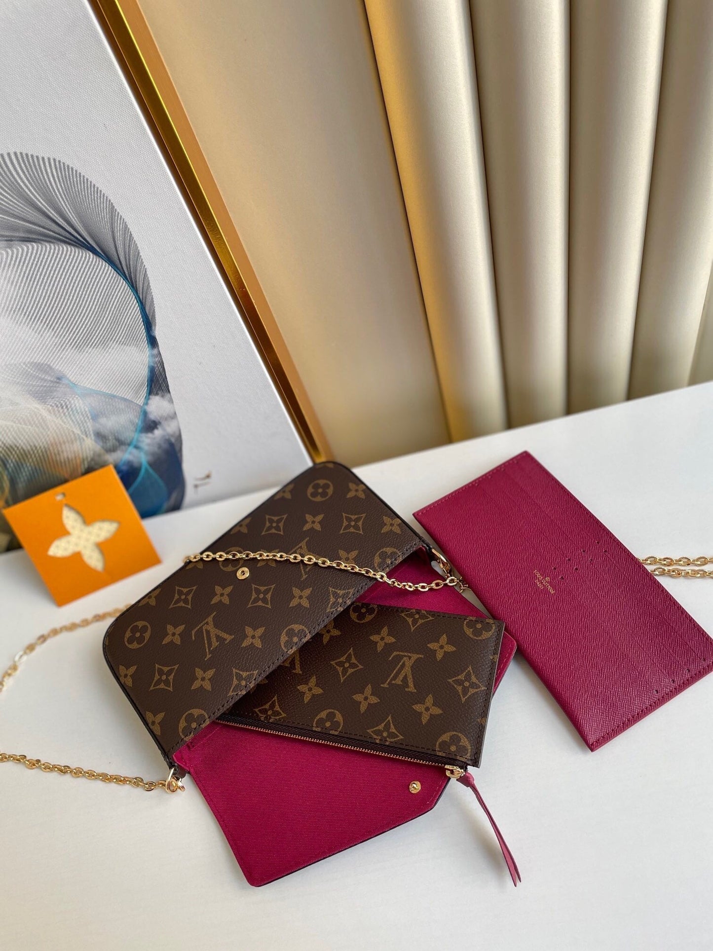 F¨¦LICIE POCHETTE 21 IN BROWN MONOGRAM CANVAS GOLD HARDWARE