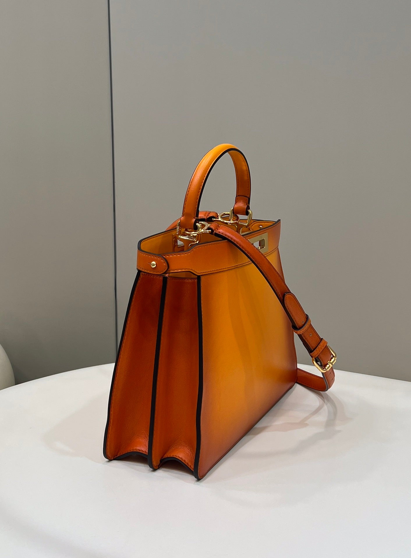 PEEKABOO ISEEU 33 IN ORANGE OMBRE SMOOTH CALFSKIN GOLD HARDWARE