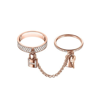 Bague double cloche Diana H.M. Kelly en or rose avec diamants