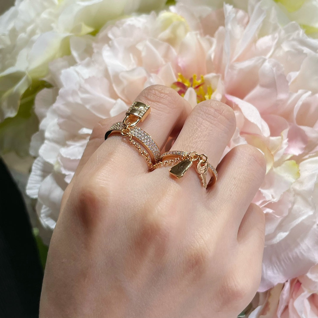 Bague double cloche Diana H.M. Kelly en or rose avec diamants