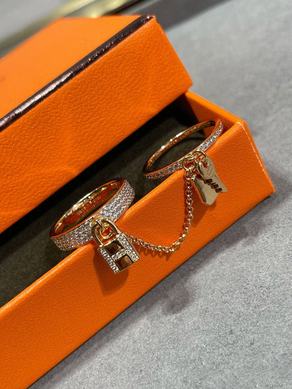 Bague double cloche Diana H.M. Kelly en or rose avec diamants