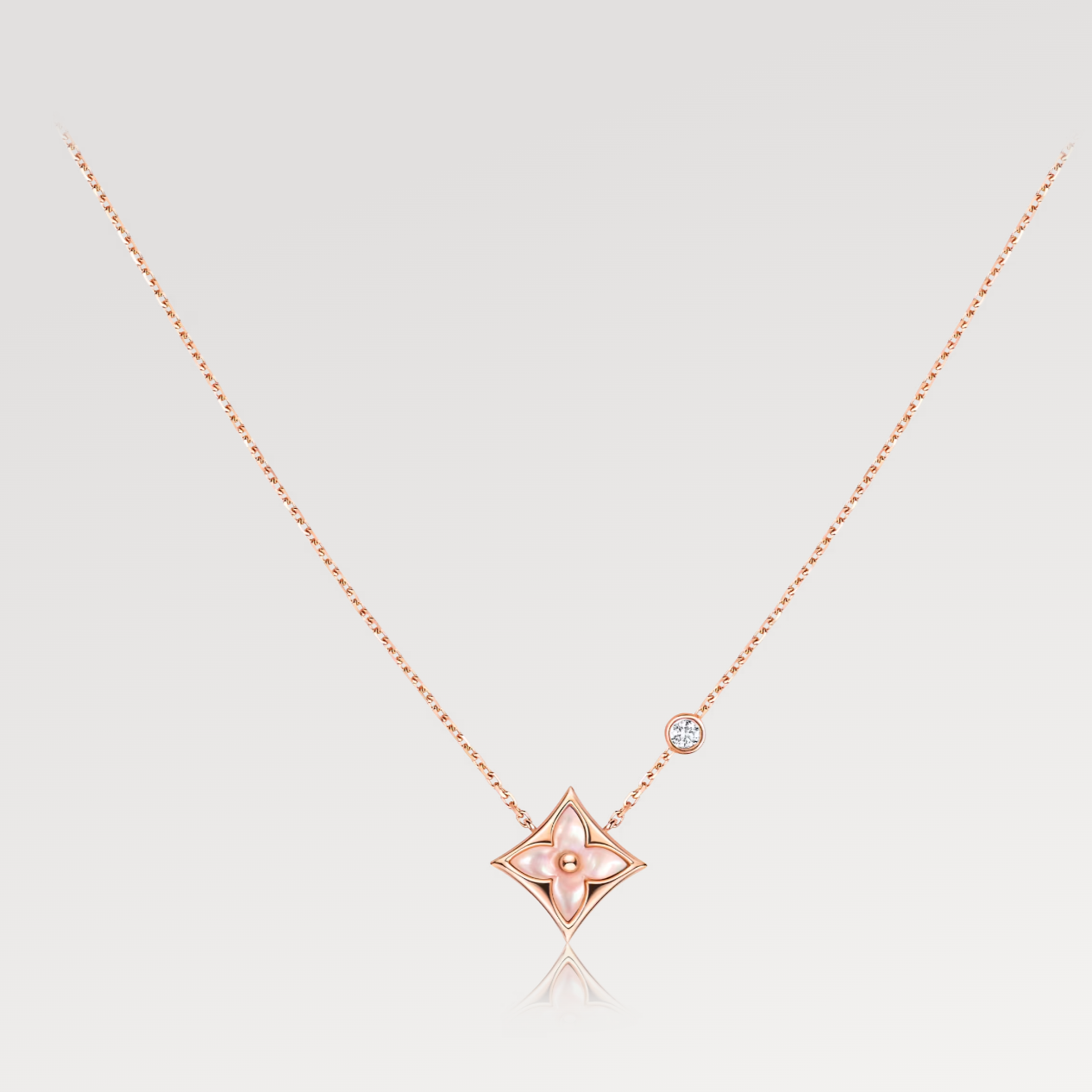 Collier en or rose avec un diamant et une nacre rose Diana Star