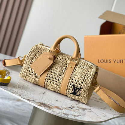 KEEPALL BANDOULI¨¨RE 25 IN BEIGE CROCHETED RAFFIA AND CALFSKIN TRIM