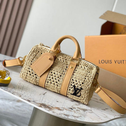 KEEPALL BANDOULI¨¨RE 25 IN BEIGE CROCHETED RAFFIA AND CALFSKIN TRIM