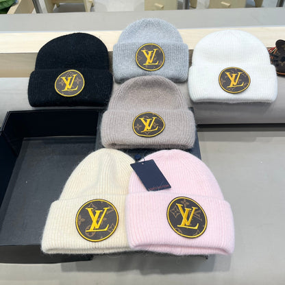 KNITTED BEANIE HAT IN PASTEL PINK WOOL AND RABBIT FUR 417757