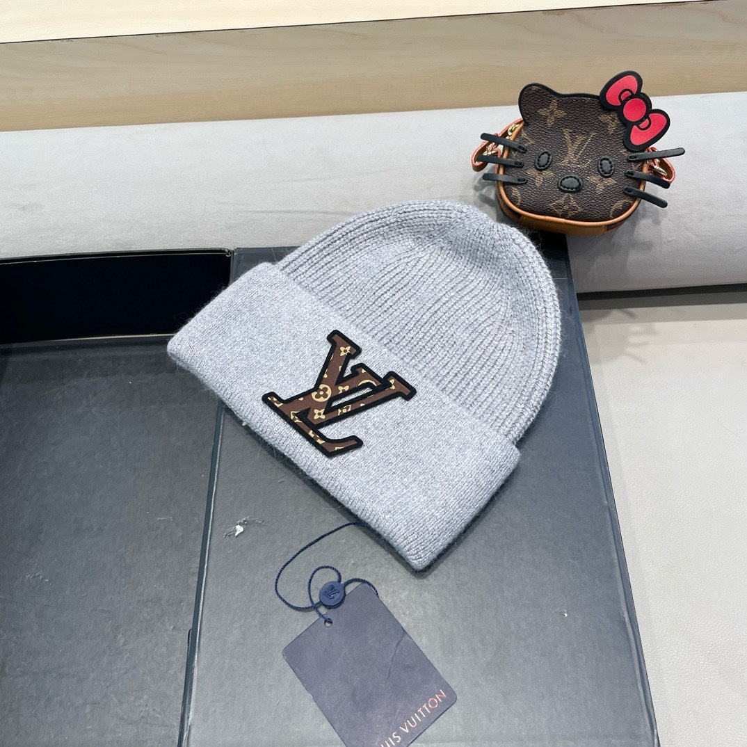 KNITTED BEANIE HAT IN GRAY FLEECE AND WOOL 426206