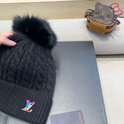 KNITTED BEANIE HAT IN BLACK WOOL 426217