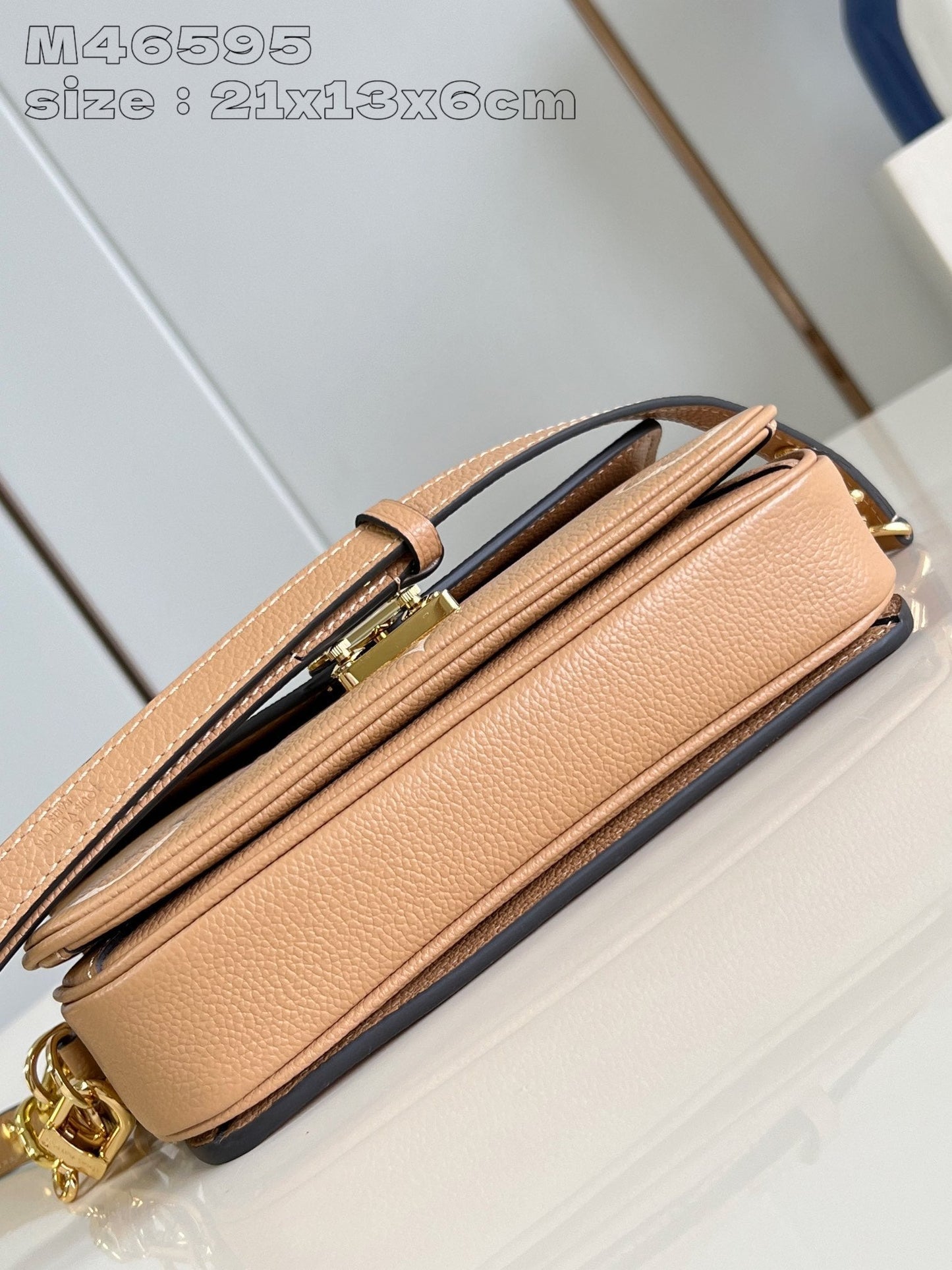 Pochette Metis East West 21.5 Brown White Monogram Empreinte Calfskin
