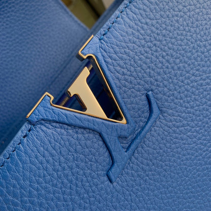 capucines mm 31.5 cobalt blue taurillon leather gold hardware