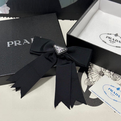 BOW HAIR CLIP IN BLACK FABRIC 406107