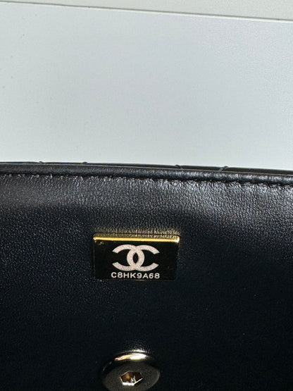 24c mini flap bag 20cm with top handle black patent calfskin