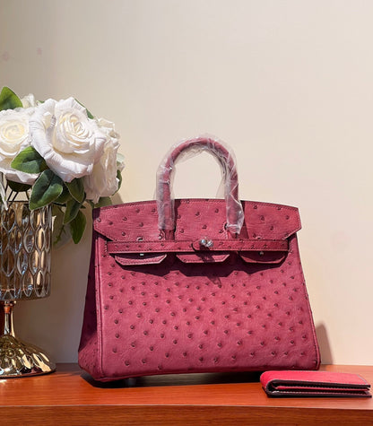 KELLY SELLIER 25 BAG IN CURRANT RED OSTRICH LEATHER WITH SILVER HARDWARE (MADE - TO - ODER)